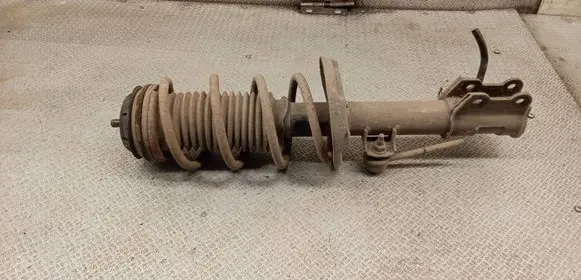Opel Corsa D Front shock absorber with coil spring 