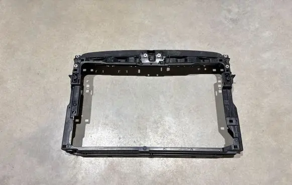 Radiator support slam panel