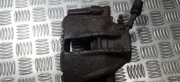 Volkswagen Golf III Front brake caliper
