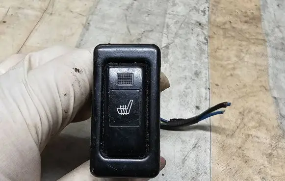 Seat heating switch