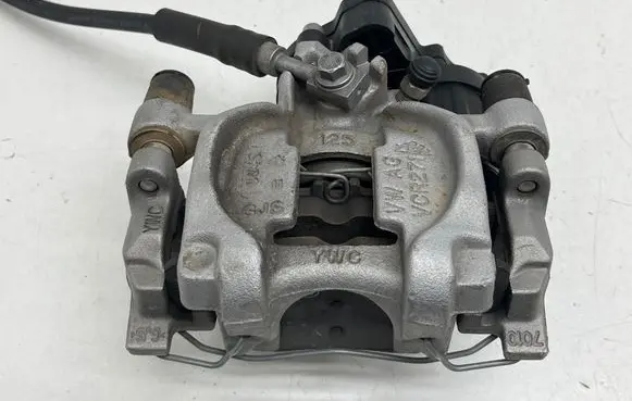 Volkswagen Jetta VII Rear brake caliper 5QM615405