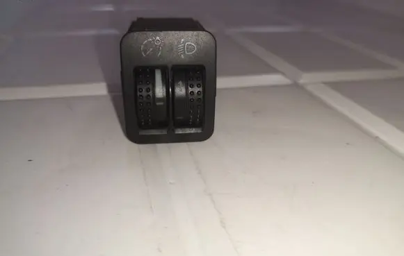 Headlight level height control switch