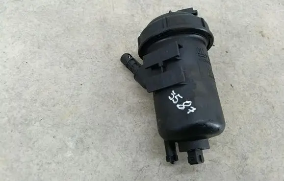 Opel Astra H Fuel filter housing 13204107