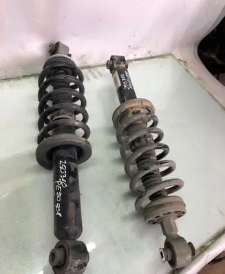Peugeot 508 II Rear shock absorber with coil spring 9827882080