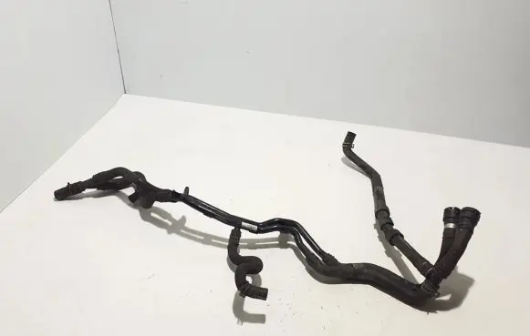 Volkswagen Golf VII Engine coolant pipe/hose 5Q0121065H