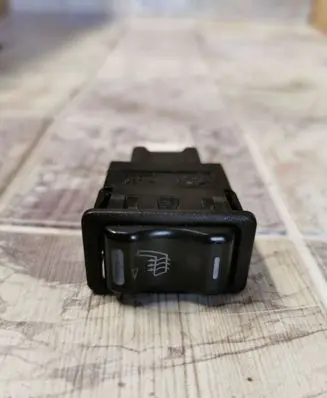 Nissan Primera Seat heating switch 24180