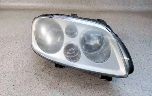 Volkswagen Touran I Headlight/headlamp 1T0941006D