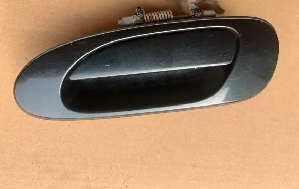 Honda Accord Front door exterior handle 946081LH