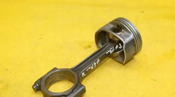 Piston with connecting rod