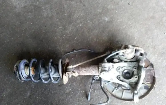 Volkswagen PASSAT B6 Front wheel hub spindle knuckle