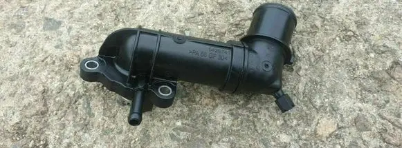Thermostat/thermostat housing