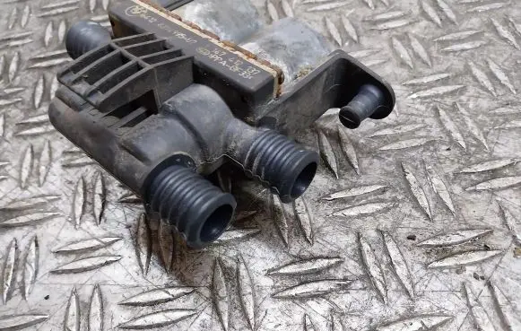 Coolant heater control valve