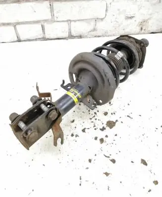 Renault Megane III Front shock absorber with coil spring