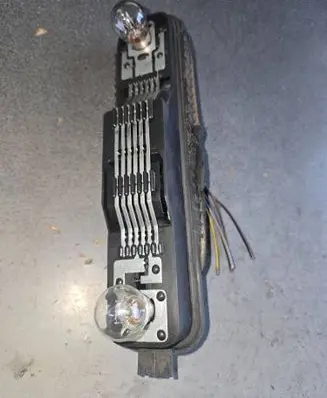 Opel Vivaro Tail light bulb cover holder 25467008