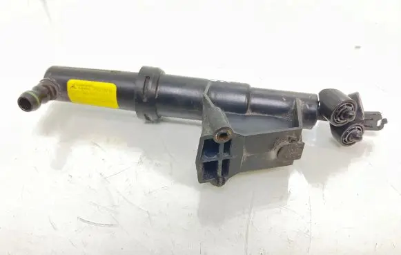 Volvo C30 Headlight washer spray nozzle 1307030347 31253730 1300750008