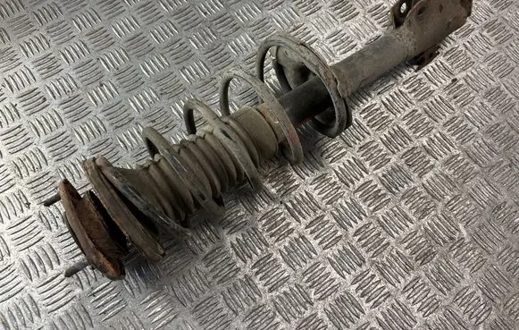 Front shock absorber with coil spring