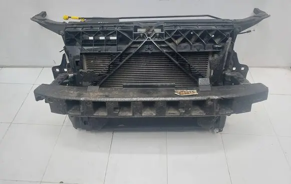 Radiator support slam panel
