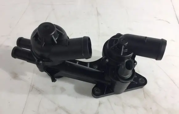 Thermostat/thermostat housing
