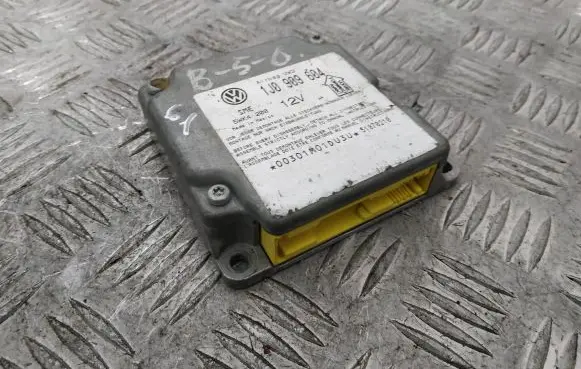 Volkswagen PASSAT B5 Airbag control unit/module 1J0909604