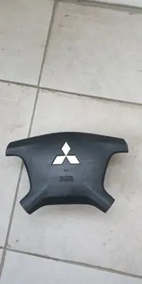 Mitsubishi Pajero Steering wheel airbag 7030A099