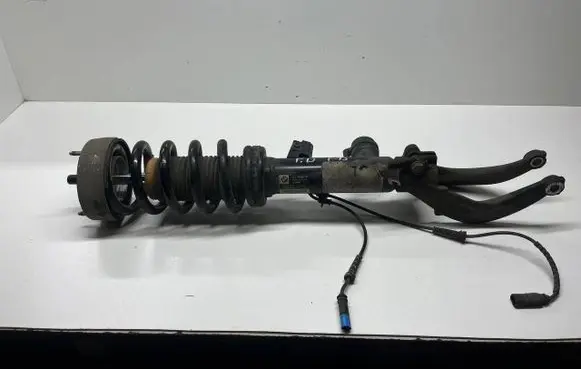 Front shock absorber with coil spring