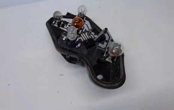 Opel Corsa D Tail light bulb cover holder Z10XEP