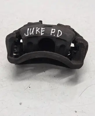 Nissan Juke I F15 Front brake caliper 
