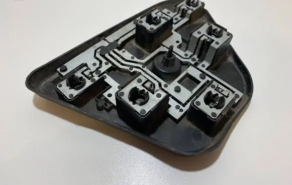 Tail light bulb cover holder