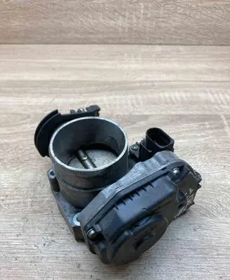 Volkswagen PASSAT B5 Throttle valve 058133063Q 408237212