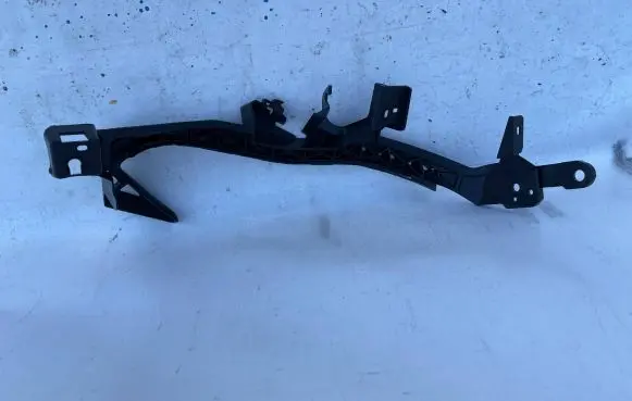 Subaru XV II Headlight/headlamp mounting bracket 57707FL010