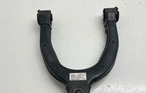 Tesla Model 3 Front upper control arm/wishbone 104432600J