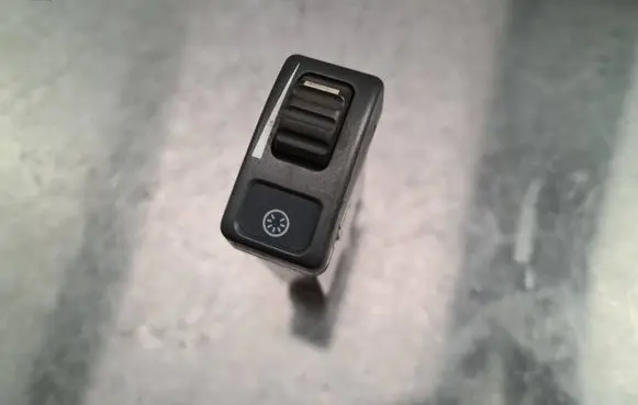 Panel lighting control switch