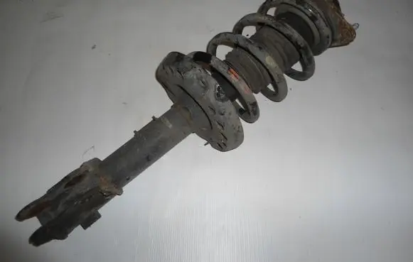 KIA Carens III Front shock absorber with coil spring