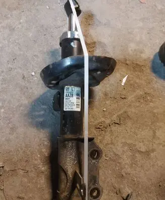 Opel Astra J Front shock absorber/damper 13354025 0607 AA28