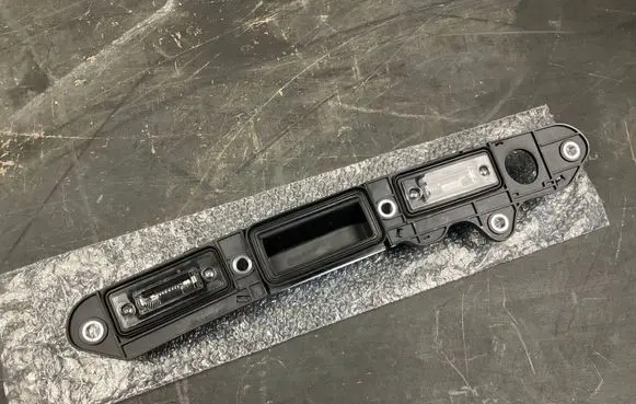 Volkswagen Jetta V Trunk door license plate light bar 1T0827574A 1T0827574L 1T0827574C