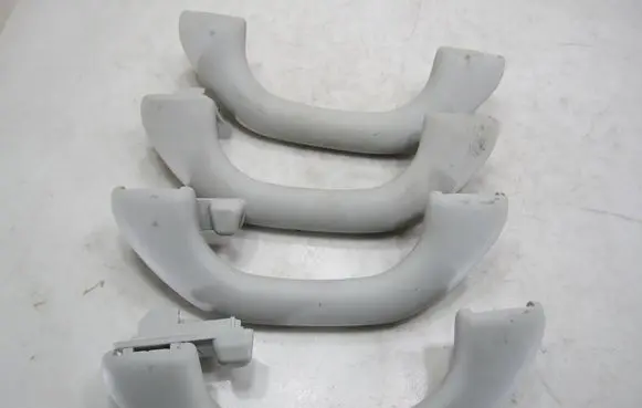 Volkswagen Golf VI A set of handles for the ceiling 1K0857607M