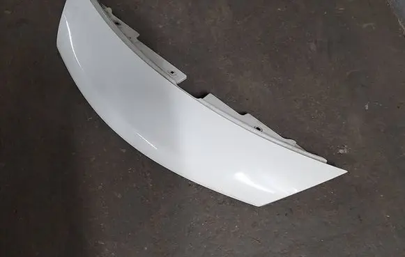 Nissan Note (E12) Front bumper upper radiator grill 623203VU0A