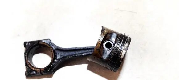 Opel Corsa B Piston with connecting rod