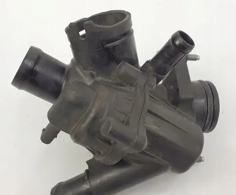 Thermostat/thermostat housing