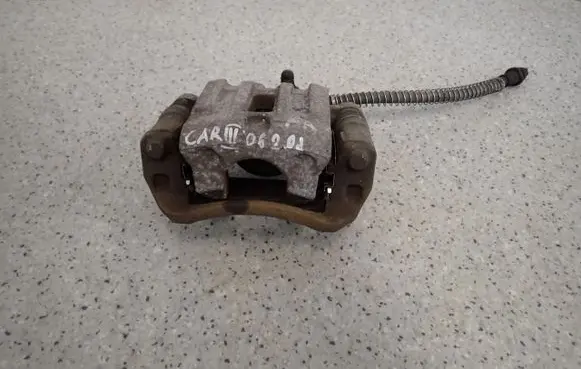 KIA Carens II Front brake caliper 