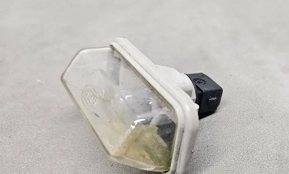 Toyota Avensis T250 Number plate light E1001479