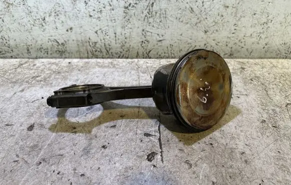 Piston with connecting rod