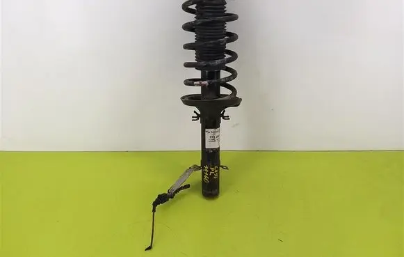 Volkswagen Golf IV Front shock absorber with coil spring