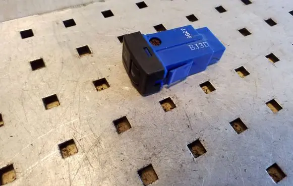 Headlight level height control switch