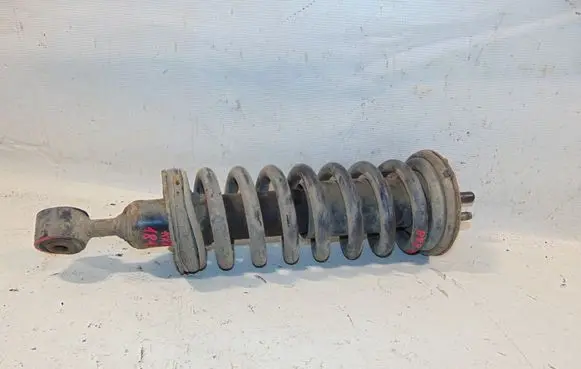 Nissan Pathfinder R51 Front shock absorber with coil spring 56100EB31D