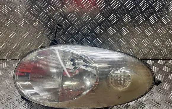 Nissan Micra Headlight/headlamp 89009189