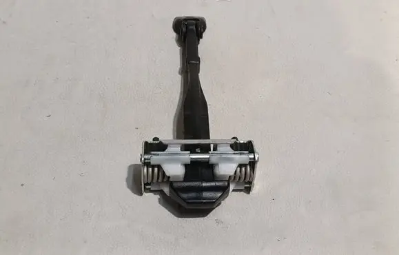 Ford Focus Front door check strap stopper JX7BA23500