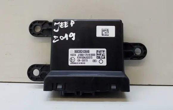 Jeep Cherokee Combustion control unit/module 068382438AB 68382438AB