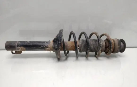 Volkswagen Golf IV Front shock absorber with coil spring 20334243
