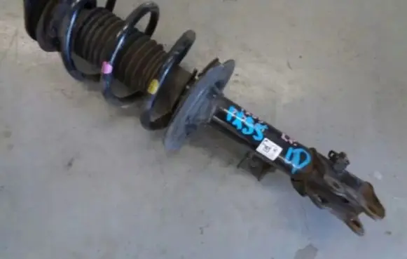 Hyundai ix35 Front shock absorber with coil spring